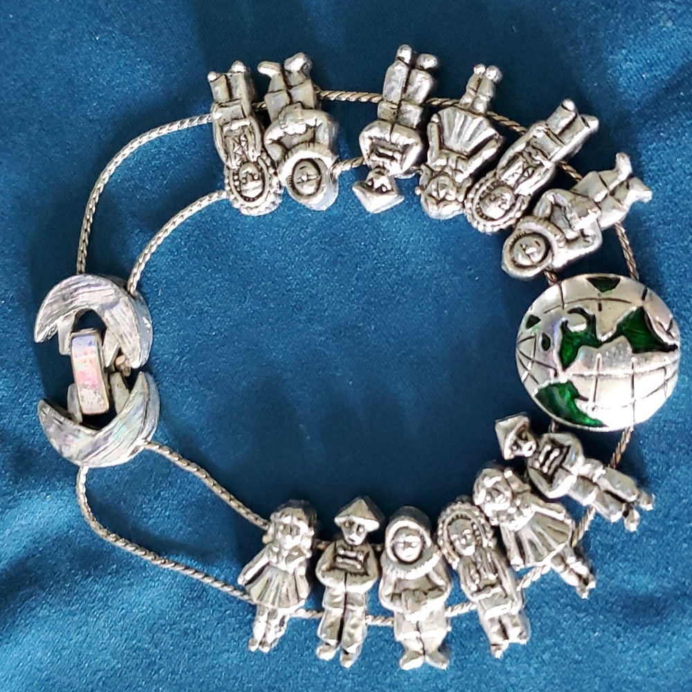 Pewter bracelet, globle people charms.